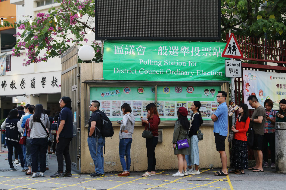 Hong Kong district council elections begin peacefully on ...
