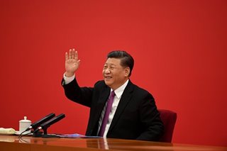 Xi visits gambling hub Macau as nearby Hong Kong seethes