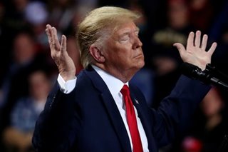 Trump pardons 2 linked to Russia probe, Blackwater guards, others