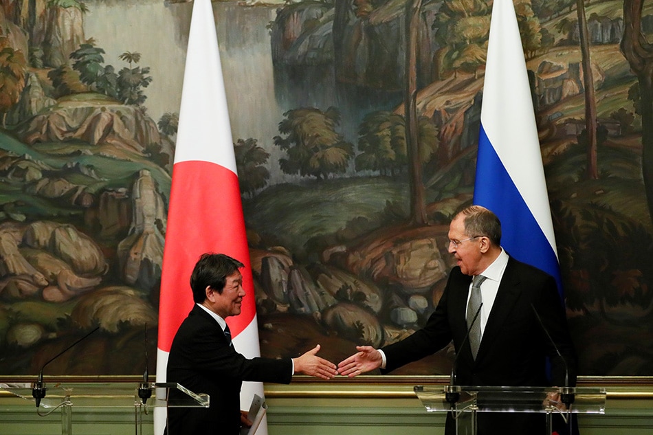 Russia, Japan meet to try to end WWII islands dispute 1