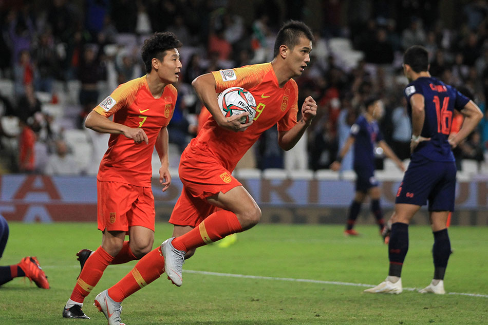 football-china-roars-back-from-behind-to-reach-asian-cup-quarters