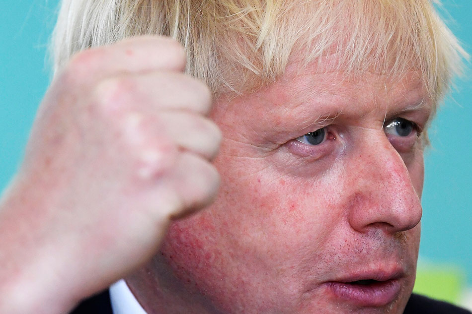 Boris Johnson heckled during speech: 'Get back to parliament'
