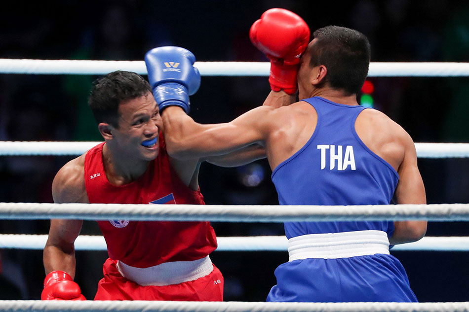 Charly Suarez outbrawled Thailand's Khunatip Pidnuch to win the men's lightweight gold medal in SEA Games boxing. File photo. George Calvelo, ABS-CBN News