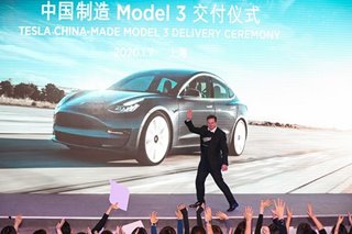 Musk hands over made-in-China Teslas to early buyers in Shanghai