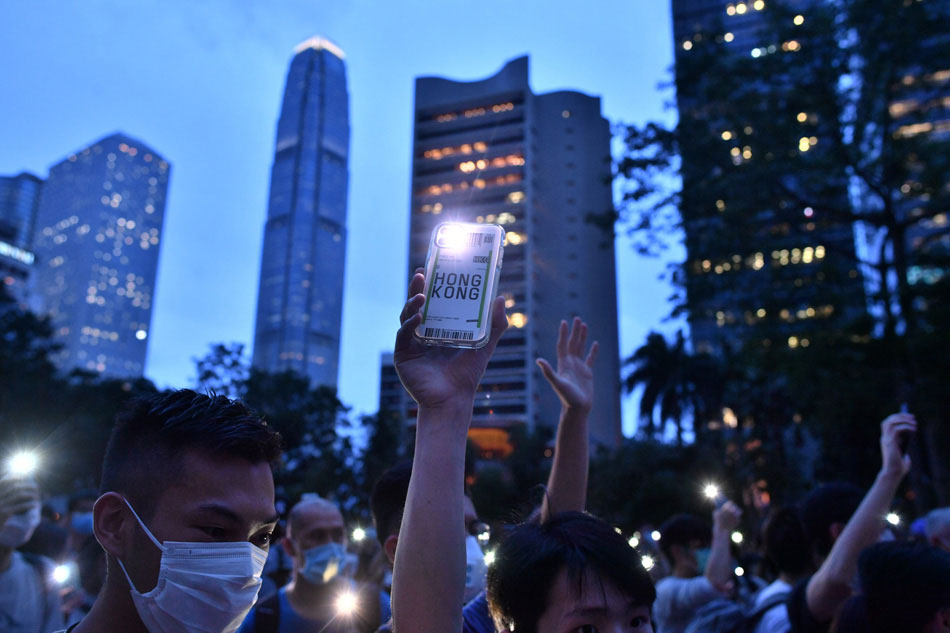 Protesters mark one year of Hong Kong demonstrations