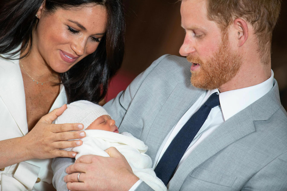 Prince Harry and Meghan Markle sue over photos of their son Archie 1