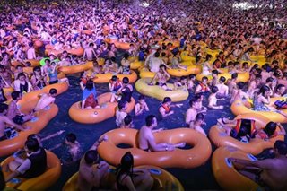 China defends Wuhan pool party after viral video prompts outrage