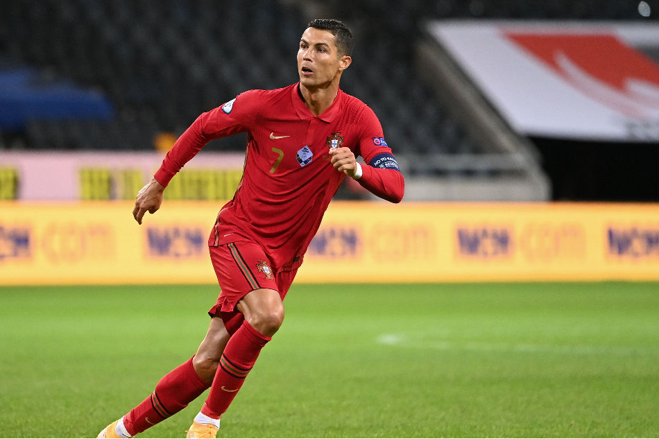 Portugal's forward Cristiano Ronaldo celebrates scoring his 100th goal for Portugal, during the UEFA Nations League football match between Sweden and Portugal on September 8, 2020 in Solna, Sweden. Jonathan Nackstrand, AFP
