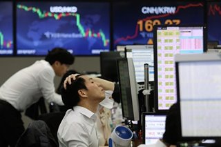 Asian markets fall further as new virus strain clouds near-term outlook