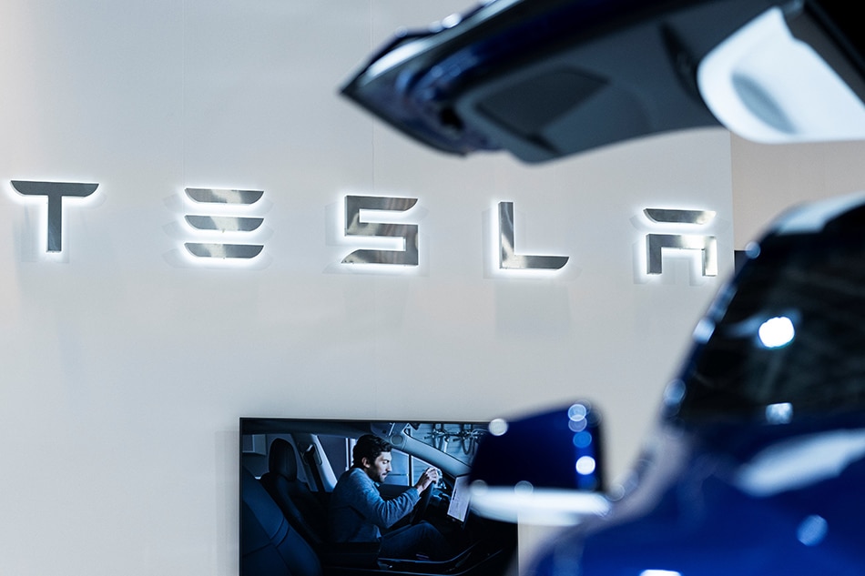 Highflying Tesla reports surprise profit despite COVID-19 upheaval 1