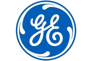 General Electric reports loss amid weakness in aviation
