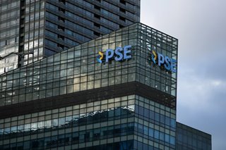 Philippine shares close higher at 6,593
