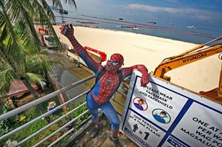 'Spiderman' visits Manila Bay's white sand beach