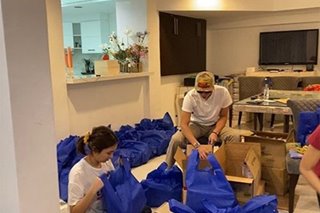 LOOK: Kathryn, Daniel repack relief goods for typhoon victims