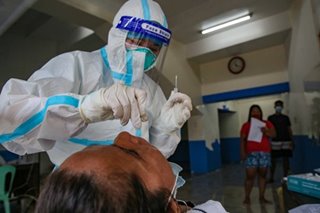 Manila residents back from provinces undergo mandatory COVID-19 testing and quarantine