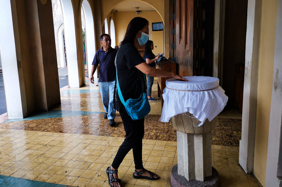 LOOK: Fewer people attend Baclaran novena amid COVID-19 scare 3