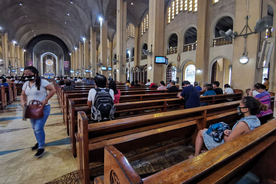 LOOK: Fewer people attend Baclaran novena amid COVID-19 scare 5
