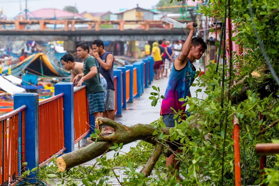 LOOK: Pinoys in COVID-19 quarantine deal with Typhoon Ambo&#39;s wrath 8