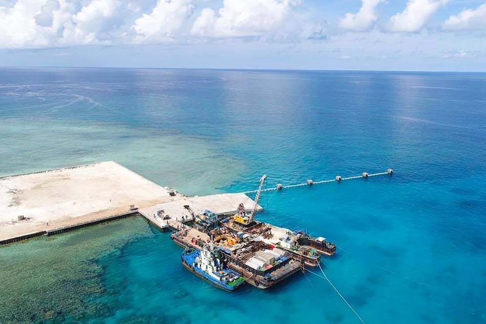 Ships dock on Pag-Asa Island, as beaching ramp inaugurated
