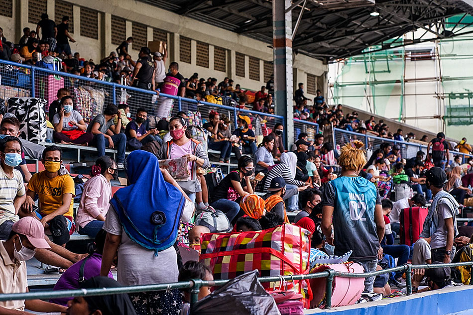 LOOK: Stranded individuals cram inside Rizal Memorial Sports Complex 4