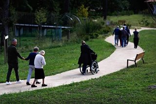 French 'Alzheimer's village': where nursing home meets the outside world