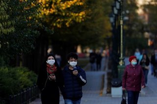 Russia orders wider use of face masks, recommends bar closures as infections rise