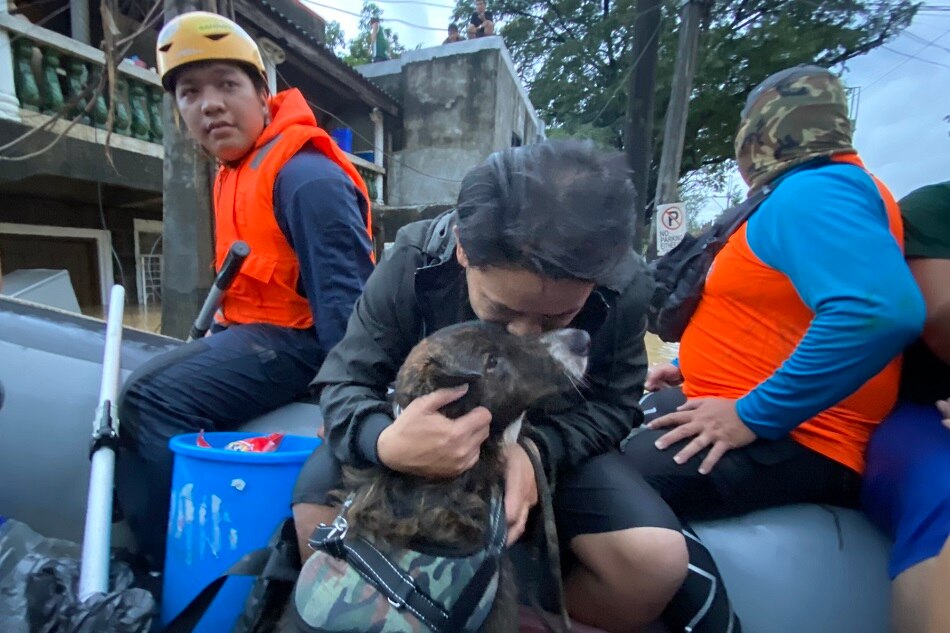 LOOK: Dog, Owner Rescued From Deep Floods In Marikina | ABS-CBN News