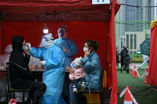 China reports 22 new coronavirus cases as Tianjin flags 'pig head' link