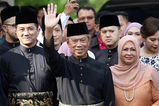 New Malaysia PM sworn in as Mahathir fights on