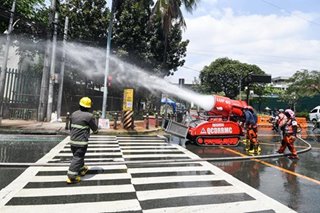 QC disaster responders conduct disinfection measures
