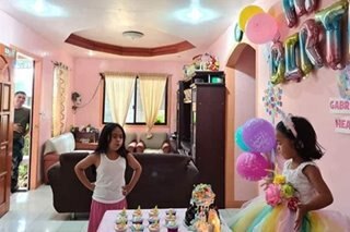 Batang nag-birthday nagsuot ng plastik para mayakap ang amang pulis na COVID-19 frontliner