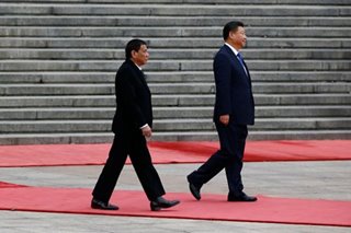 China warns PH vs military blocs, vows more investment