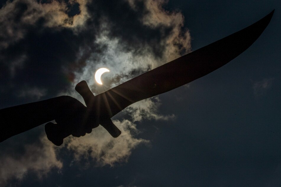 SLIDESHOW: Annular solar eclipse captivates sky gazers 12