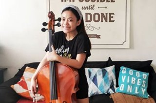 Kim Molina is learning how to play the cello