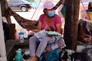 Stranded Pinoys told to coordinate with LGUs on trips as hundreds camp out on streets