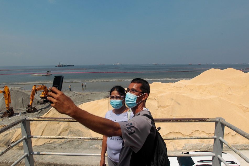 Funds for Manila Bay white sand can’t be used for pandemic: DENR 1