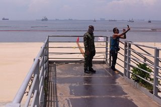 A glimpse of Manila Bay's controversial 'white sand'