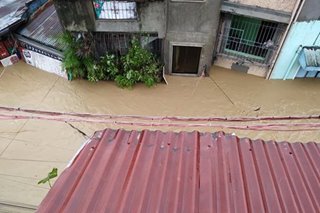 Marikina residents trapped by flood call for rescue