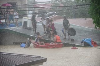 Residents on rooftops as Typhoon Ulysses batters Luzon
