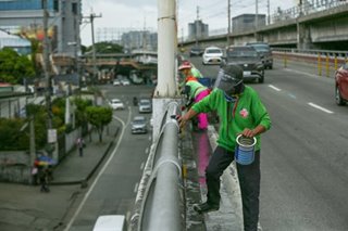 Cleaning Manila's main highway