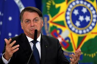 Brazil's Bolsonaro rolls out tanks to cover his weak position