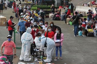 Hundreds line up for antigen test in Manila for travel clearance