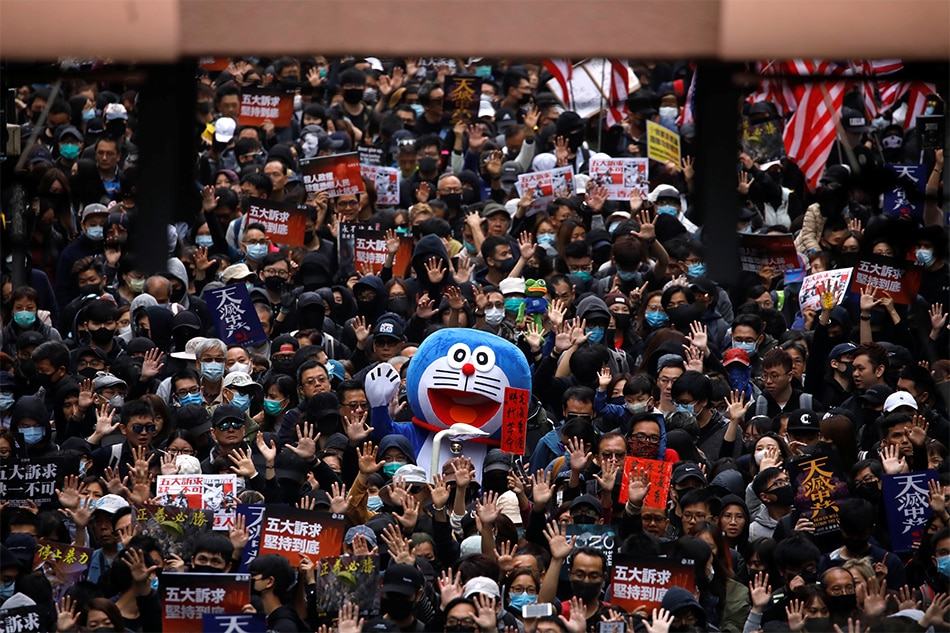 Hundreds arrested in Hong Kong in New Year&#39;s Day protests: police 1