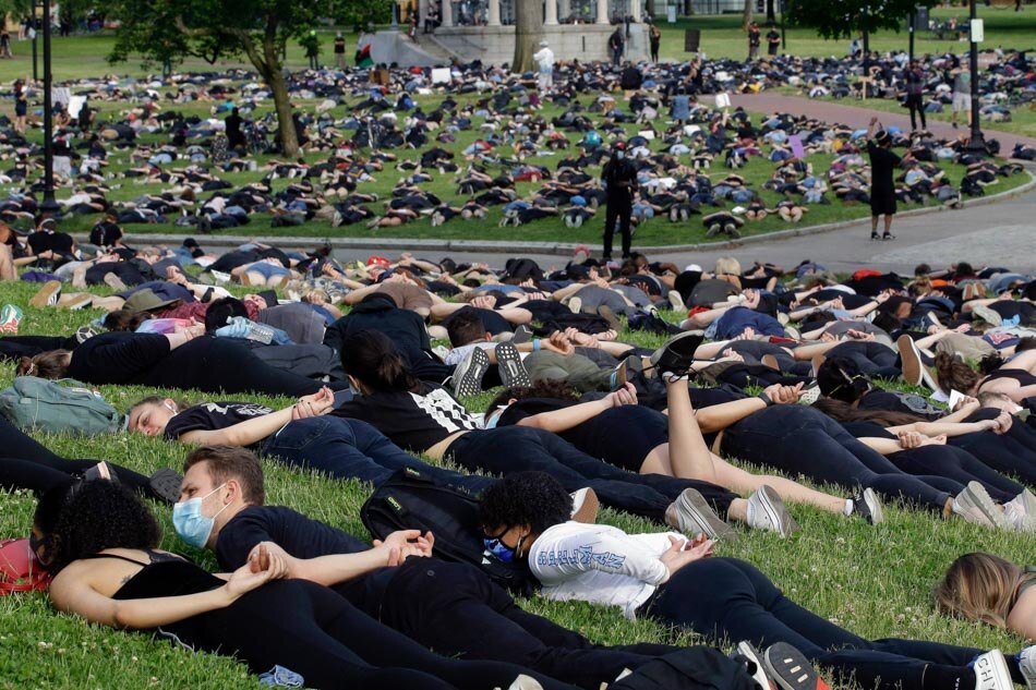 Boston protesters hold die-in