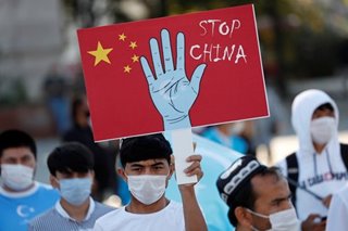 US declares China's repression of Uighurs 'genocide'