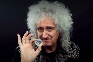 UK issues commemorative coin celebrating rock band Queen