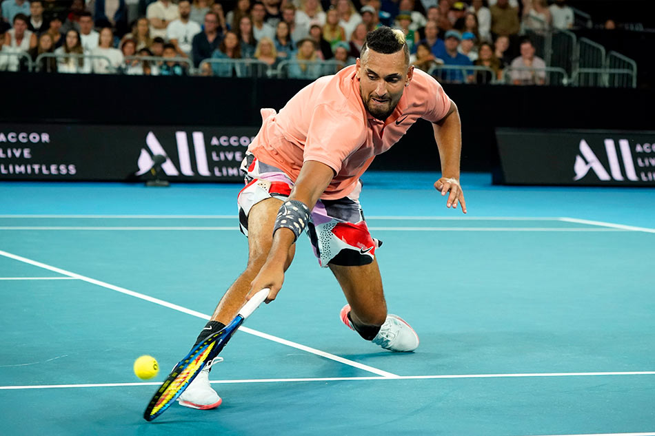 Australian Open Kyrgios rides an epic storm to reach second week in