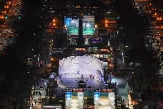 Sapporo Snow Festival opens amid coronavirus fears, warm winter