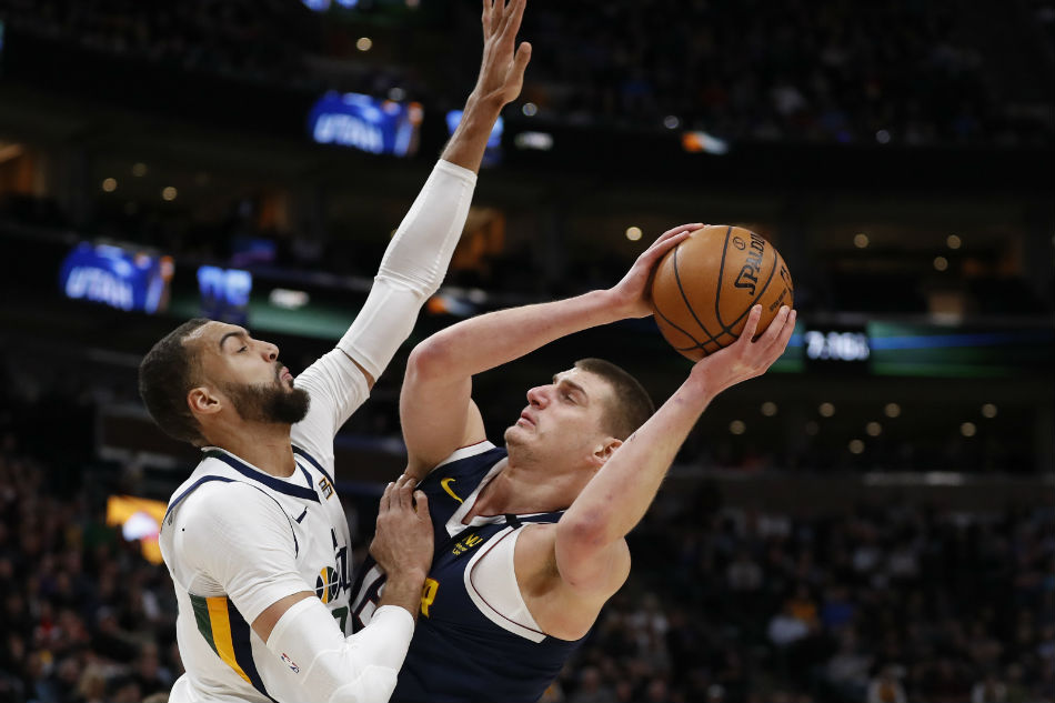 Nba Jokics Triple Double Carries Nuggets Past Jazz Abs Cbn News