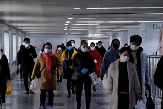 China stutters back to work as virus deaths rise
